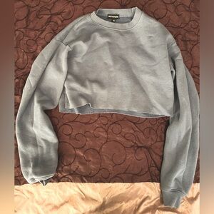 PrettyLittleThing cropped sweater. US size XS. Medium wear. Dusty blue.